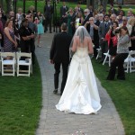 The bride and her dad walk down the aisle / Photo by Carol Chaput