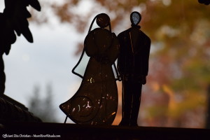 Metal sculpture of bride and groom