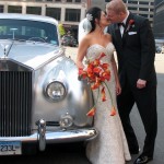 Nicole & Terry kiss by a Silver Cloud Rolls Royce